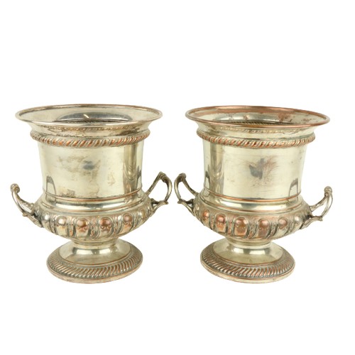 16 - A pair of silver plated campana shaped two handled Champagne Coolers, 25cms (9 1/2