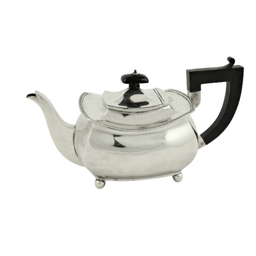 39 - A rectangular ogee shaped silver Teapot, by Atkin Bros., Sheffield c. 1900, with ebonised handle, 23... 
