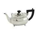 A rectangular ogee shaped silver Teapot, by Atkin Bros., Sheffield c. 1900, with ebonised handle, 23... 
