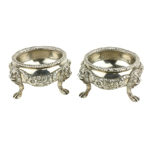 44 - A pair of heavy cast silver tub shaped Salts, London 1926, by AP, FP and AP, each with heavy cast fl... 