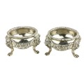 A pair of heavy cast silver tub shaped Salts, London 1926, by AP, FP and AP, each with heavy cast fl... 