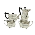 A four piece silver Tea and Coffee Service, Chester 1926, comprising coffee pot, teapot, sugar bowl ... 