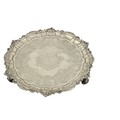 An Irish Georgian period chased and crested silver Salver, within a leaf and shell chased scroll edg... 