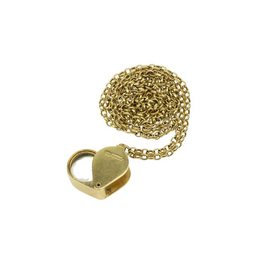 261 - An 18ct gold miniature folding eye Loupe, together with an 18ct gold link Chain, approx. 91cms (36