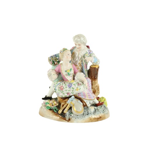 373 - A Meissen porcelain Group, c. 1900, decorated with two seated elegant figures, decorated with colour... 