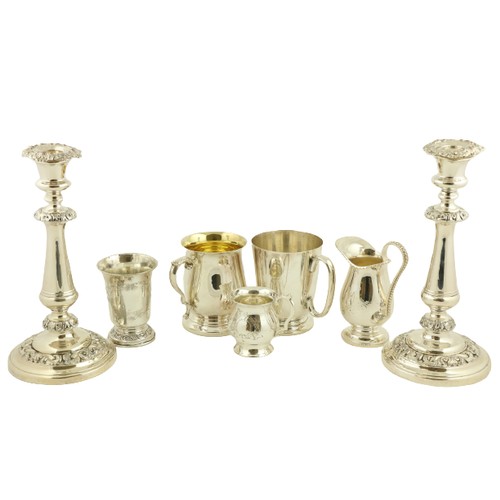 9 - A pair of 19th Century Sheffield silver plated and leaf cast Candlesticks, each with baluster stem, ... 
