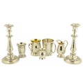 A pair of 19th Century Sheffield silver plated and leaf cast Candlesticks, each with baluster stem, ... 