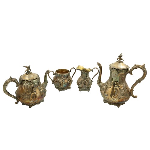 12 - A four piece silver plated Tea and Coffee Service, comprising: a coffee pot with bird finial on a pe... 