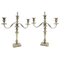 A pair of two branch three light Sheffield silver plated Candelabra, each with leaf cast scroll arms... 