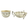 A lobed silver Bowl, London 1903, on three rams mask and scroll legs; together with a Birmingham sil... 