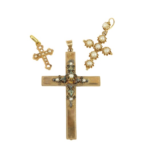 234 - An attractive small cased gold Crucifix, with seed pearls; and two smaller similar ditto. A lot. (3)... 