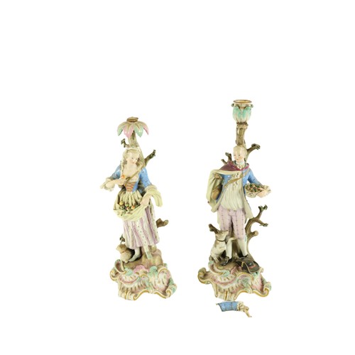 371 - A pair of 19th Century Meissen figural Candlesticks, both as is, one modelled as an elegant Gentlema... 