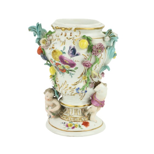 380 - A 19th Century porcelain Meissen Vase, the floral encrusted design with cherubs and fruit, approx. 2... 