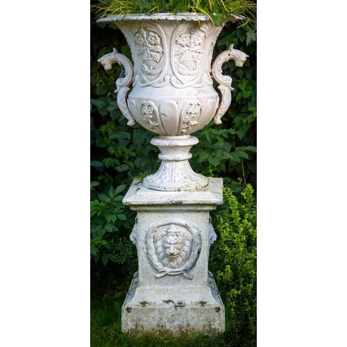 1001 - A large heavy set of 2 unusual cast iron Garden Urns, each relief cast with vases of flowers and two... 