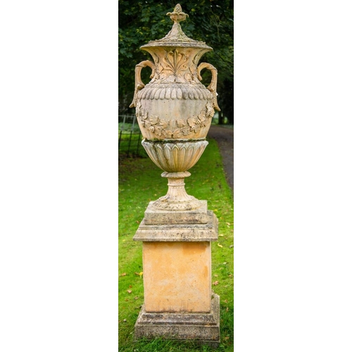 1003 - A massive pair of terracotta coloured composition stone Garden Urns, covers and plinths, 228cms x 61... 