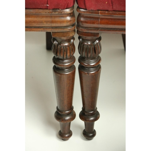 619 - A set of 4 Victorian mahogany Side Chairs, each with a cartouche shaped back with upholstered centre... 