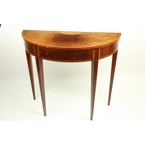 627 - A walnut and rosewood banded demi-lune Side Table, in the George III style, with central satinw... 