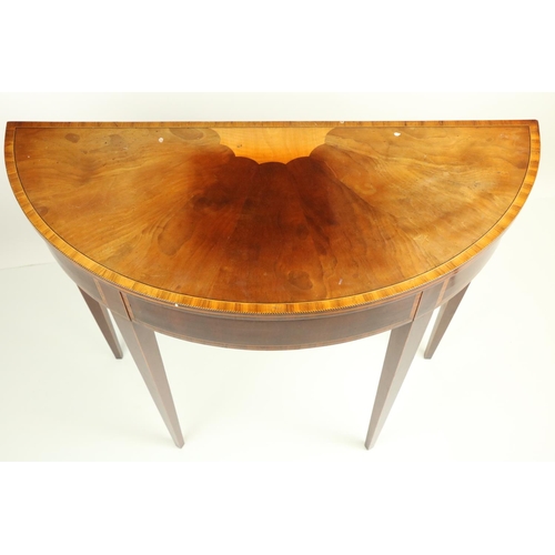 627 - A walnut and rosewood banded demi-lune Side Table, in the George III style, with central satinw... 