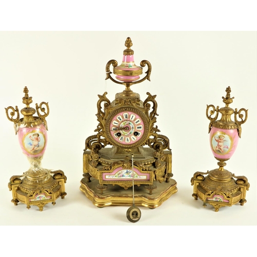 637 - A late 19th Century French gilt metal Mantle Clock Garniture, the clock with a two handled urn finia... 