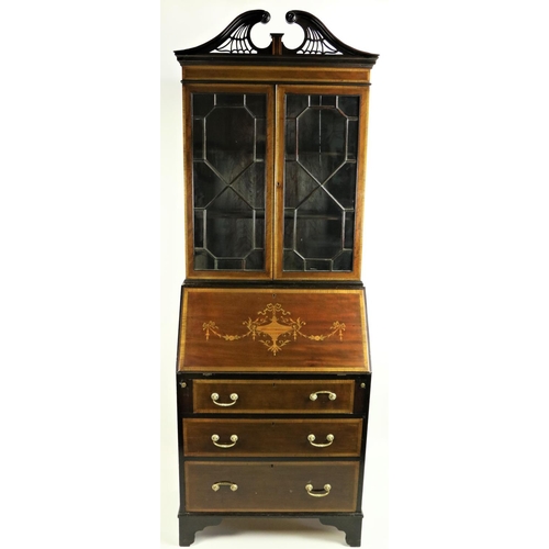 645 - An Edwardian inlaid and crossbanded mahogany Bureau Bookcase, the pierced and moulded swan neck pedi... 