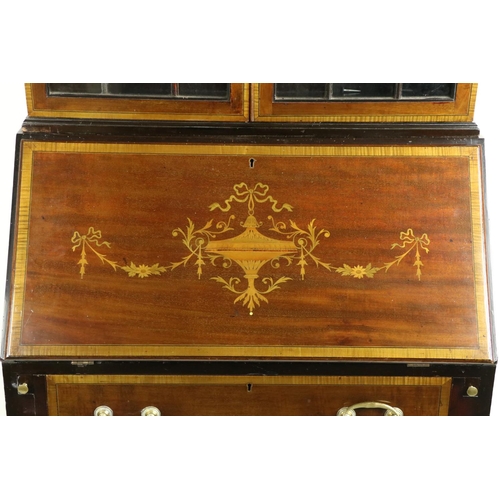 645 - An Edwardian inlaid and crossbanded mahogany Bureau Bookcase, the pierced and moulded swan neck pedi... 