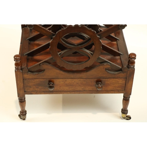 658 - A William IV period mahogany Canterbury, with three X shaped divisions each with turned rails and sh... 