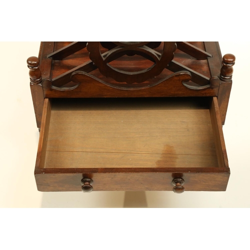 658 - A William IV period mahogany Canterbury, with three X shaped divisions each with turned rails and sh... 