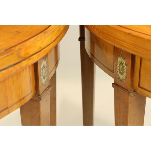 663 - An attractive and fine quality pair of demi-lune fold-over satinwood Card Tables, in the style of Wi... 