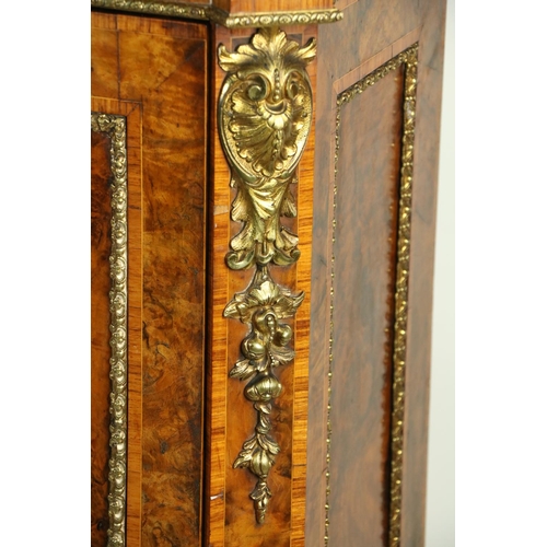 667 - An attractive 19th Century walnut Side Cabinet, the shaped top with egg n' dart moulding, decorative... 