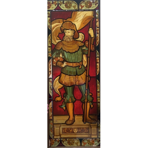 678 - A painted printed transfer glass Panel, depicting a Cavalier wearing armour holding a flagstaff, wit... 