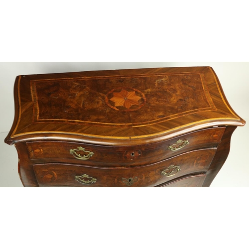 697 - A good 18th Century Continental walnut Commode, of serpentine form, the top with kingwood and satinw... 