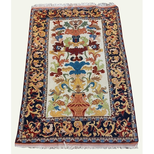 702 - A fine quality 19th Century Middle Eastern silk Rug, the rectangular cream ground centre with multip... 