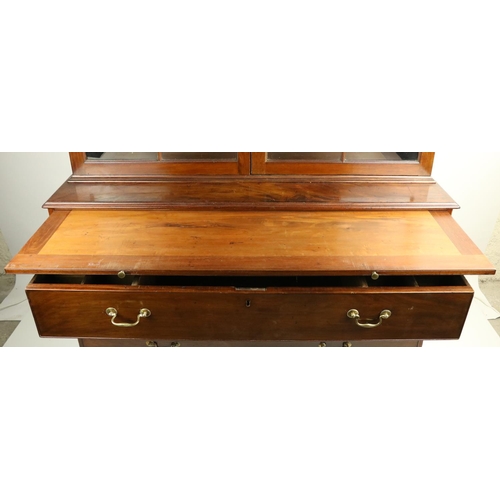 794 - An unusual George III period mahogany Bookcase, with moulded cornice above two six panel glazed door... 