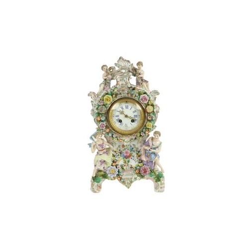 796 - A German porcelain Mantle Clock, c. 1900, with Lenzkirch movement, the case crested with two cherubs... 