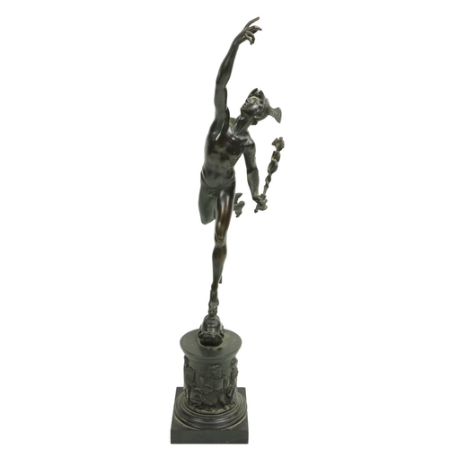 809 - A 19th Century classical bronze Figure modelled as Mercury, holding the Medusa standing one foot on ... 