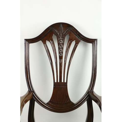 815 - A large pair of mahogany Dining Room Armchairs, each in the Hepplewhite style, with shield shaped ba... 