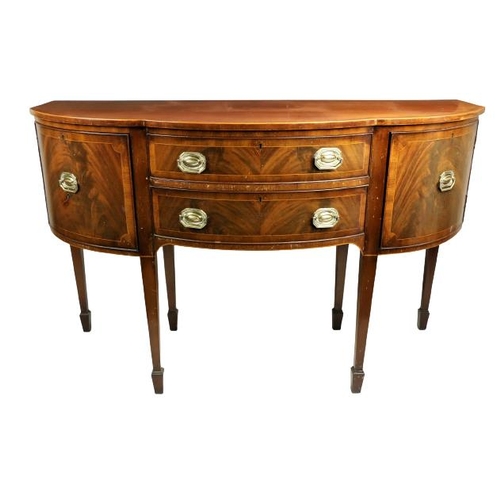 817 - A serpentine fronted inlaid and crossbanded mahogany Sideboard, with two long centre drawers flanked... 