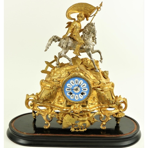 818 - A gilt metal and silvered French Mantle Clock, the top surmounted with a Medieval General in full ar... 