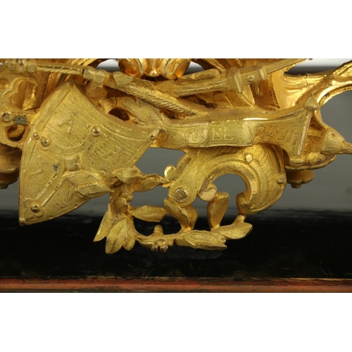 818 - A gilt metal and silvered French Mantle Clock, the top surmounted with a Medieval General in full ar... 