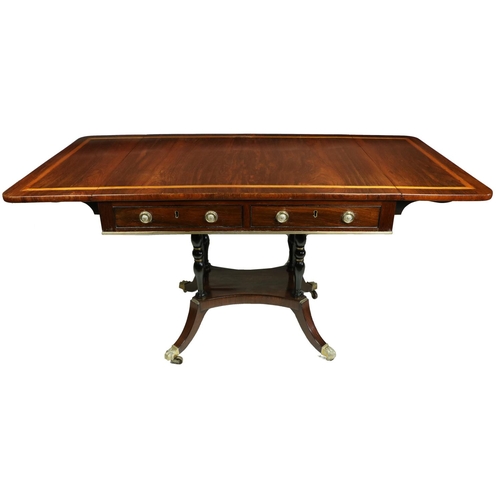 822 - A Regency period satinwood banded rosewood Sofa Table, the rectangular flaps with rounded corners, f... 