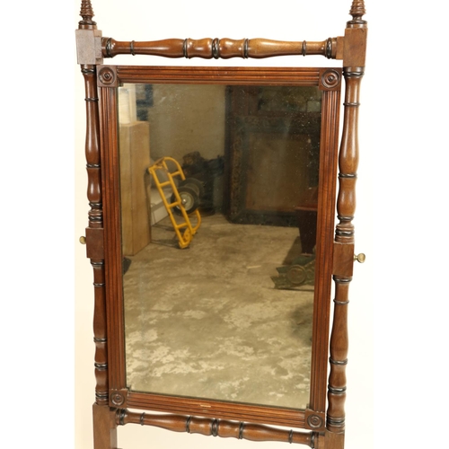 827 - A George IV period mahogany and ebony Cheval Mirror, the ring turned baluster frame with fluted urn ... 