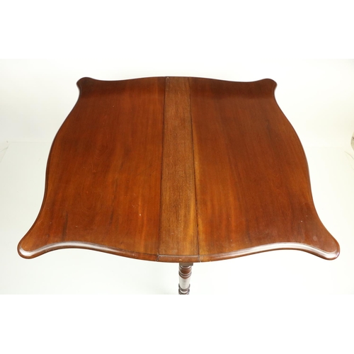 830 - A Victorian mahogany Sutherland Table, with serpentine shaped drop leaves, raised on four turned leg... 