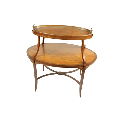 836 - An attractive oval satinwood and mahogany banded inlaid two tier Supper Table, the top with a lift o... 