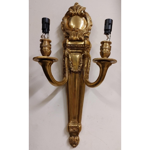 839 - A pair of cast brass quiver shaped two branch Wall Lights, each with cartouche crest and hanging lea... 