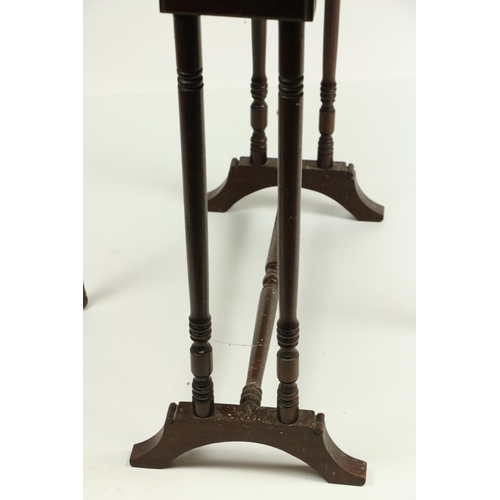 843 - A mahogany drop leaf Sutherland Table, Edwardian, the rectangular flaps with canted corners raised o... 