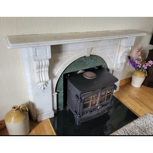 636 - A Victorian Carrera marble Fire Surround, the plain shelf with moulded edge, over an arched centre, ... 