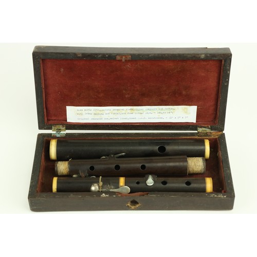 852 - A rare early 19th Century rosewood Flute, stamped Shepherd and Sutton each section with bone banding... 