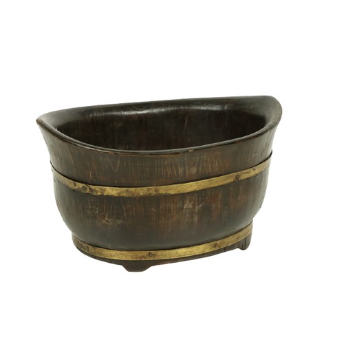 664A - A 19th Century Provincial wood dug-out canoe shaped over-sized Bowl, with double brass band on shape... 