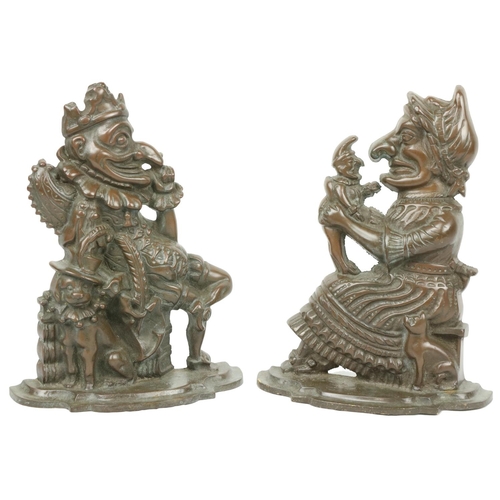 991A - A pair of 'Punch and Judy,' cast iron Door Stops. (2)