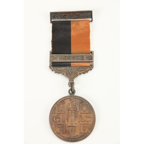 602 - Medal: 1917-21, A Comhrach War of Independence Medal awarded for Combative Action, with bar, black a... 